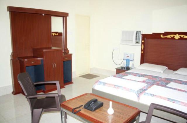 Hotel Maa Kamakhya Puri Værelse billede